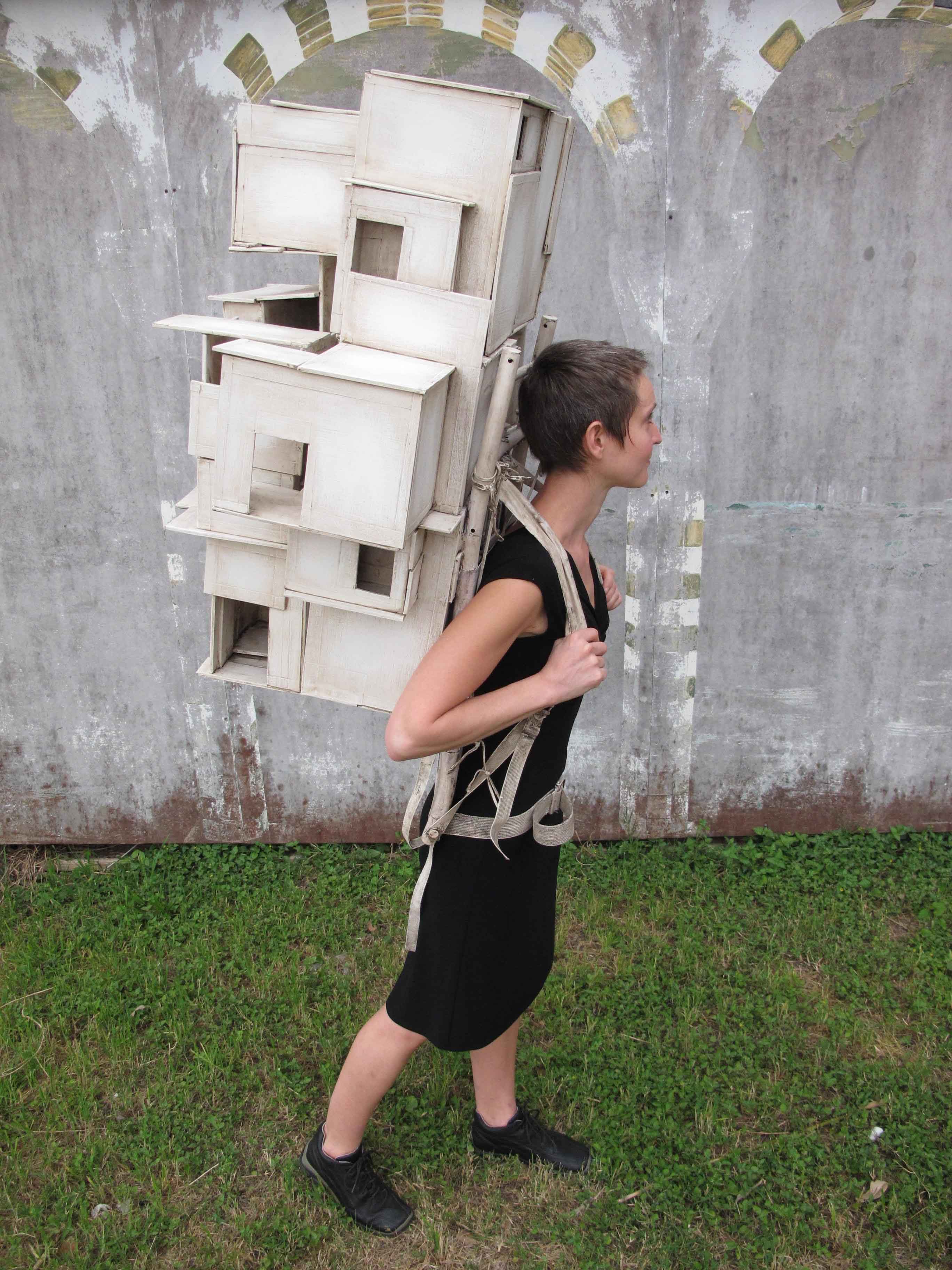 a backpack that looks like houses smushed together